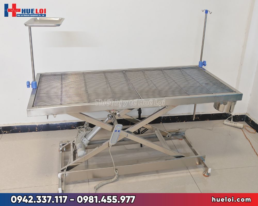 Bàn mổ thú y giá rẻ chân chữ X nâng hạ điện